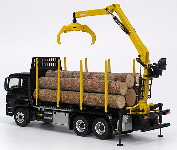 Picture MAN / Palfinger / Doll TGS 33.560 short timber transport – „Doll“