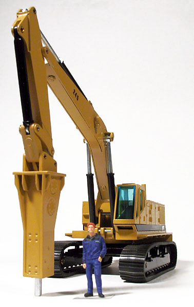 Foto Caterpillar 245 mit Hammer