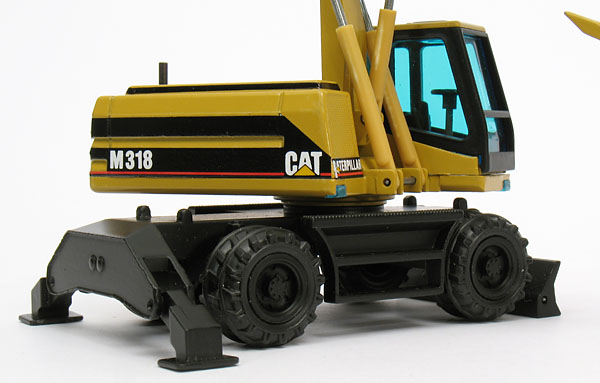 Foto Caterpillar M318